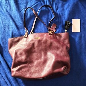 Mauve leather Coach tote.